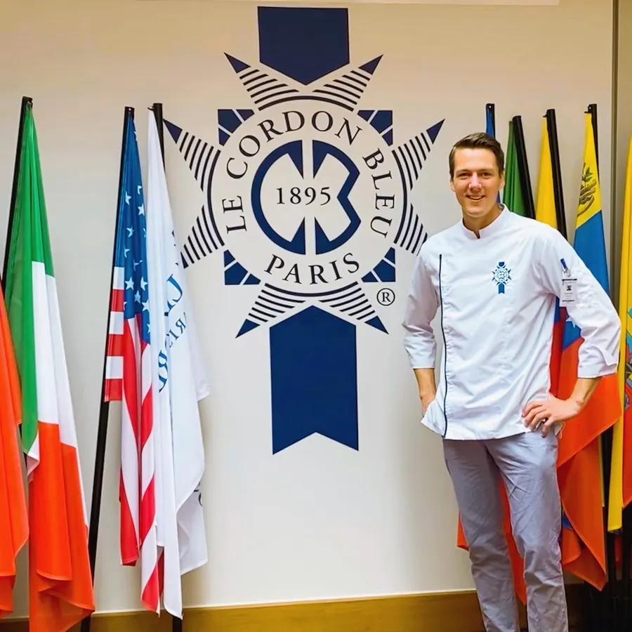 Kevin in chef whites at Le Cordon Bleu, Paris